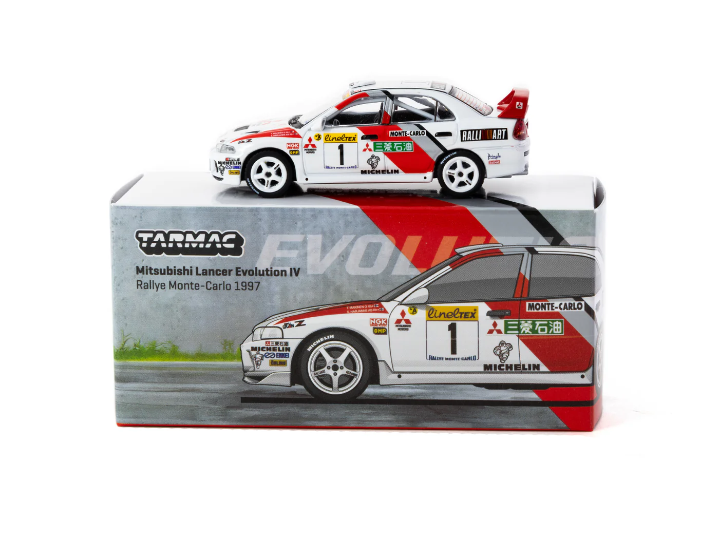 Tarmac Works Mitsubishi Lancer Evolution IV Rallye Monte-Carlo 1997 1:64 ( Imagem 2 de 3 ) - Preview